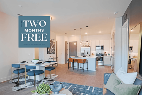 a living room and kitchen with a sign that reads two months free